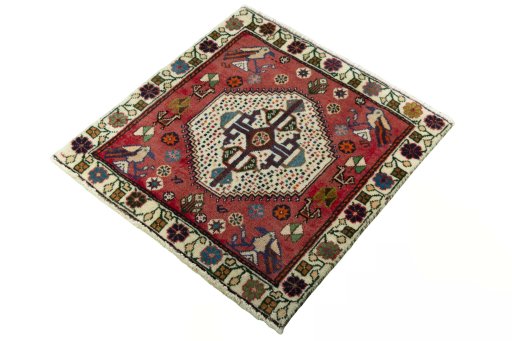 Corner detail of 2000s Shiraz rug showing border pattern and Wool pile