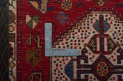 Backside of handmade 2000s Shiraz rug showing knot structure and weave density