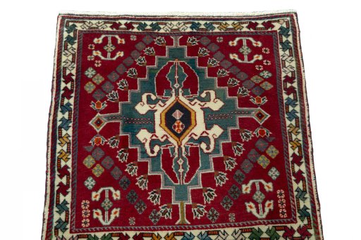 Surface texture of 2000s Shiraz rug with natural Wool and intricate pattern