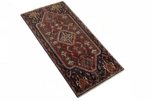 Close-up detail of 2000s Shiraz rug from Iran / Persia showing Wool weave
