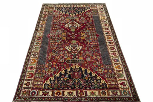 Surface texture of 2000s Shiraz rug with natural Wool and intricate pattern