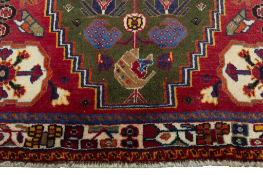 Central medallion detail of 2000s Shiraz rug from Iran / Persia