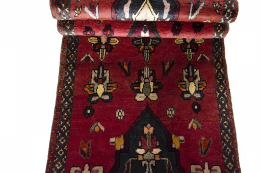 Full view of 2000s Shiraz rug from Iran / Persia, 328 × 64 cm in Red tones