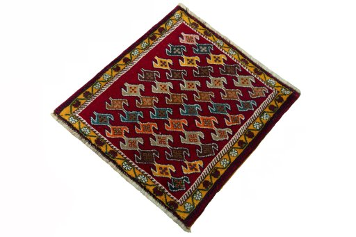 Corner detail of 2000s Shiraz rug showing border pattern and Wool pile
