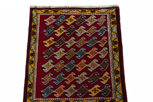Surface texture of 2000s Shiraz rug with natural Wool and intricate pattern