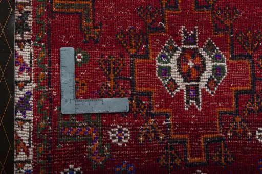 Backside of handmade 2000s Shiraz rug showing knot structure and weave density
