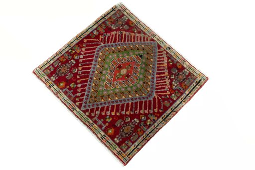 Corner detail of 2000s Shiraz rug showing border pattern and Wool pile