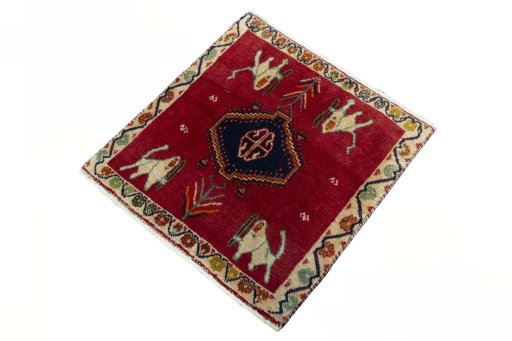 Corner detail of 2000s Shiraz rug showing border pattern and Wool pile