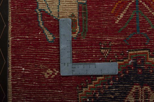Backside of handmade 2000s Shiraz rug showing knot structure and weave density