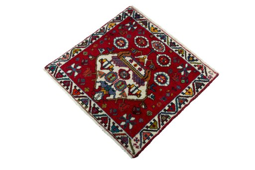 Corner detail of 2000s Shiraz rug showing border pattern and Wool pile