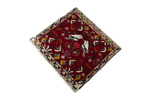 Corner detail of 2000s Shiraz rug showing border pattern and Wool pile