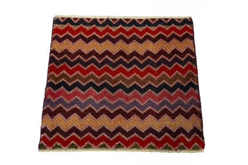 Surface texture of 2000s Shiraz rug with natural Wool and intricate pattern