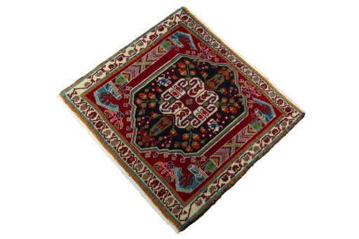 Corner detail of 2000s Shiraz rug showing border pattern and Wool pile