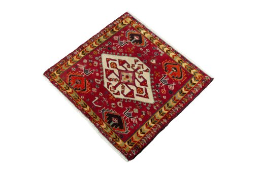 Corner detail of 2000s Shiraz rug showing border pattern and Wool pile