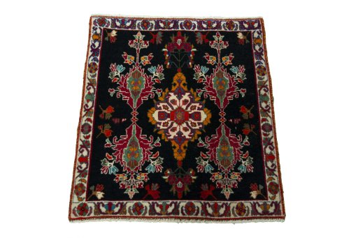 Surface texture of 2000s Shiraz rug with natural Wool and intricate pattern