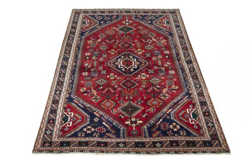 Surface texture of 2000s Shiraz rug with natural Wool and intricate pattern