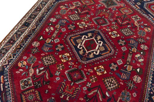 Backside of handmade 2000s Shiraz rug showing knot structure and weave density
