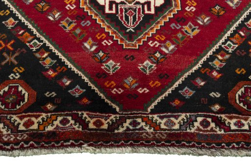 Central medallion detail of 2000s Shiraz rug from Iran / Persia