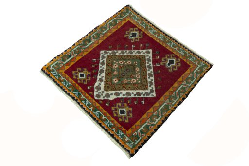 Corner detail of 2000s Shiraz rug showing border pattern and Wool pile