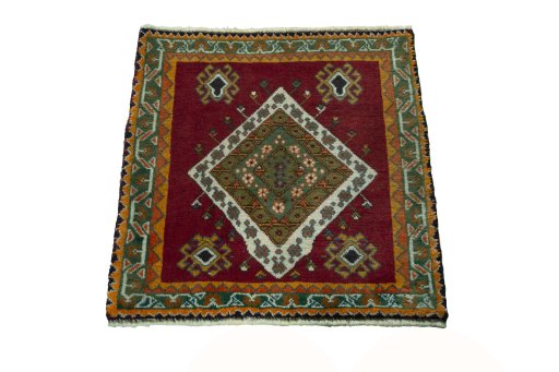 Surface texture of 2000s Shiraz rug with natural Wool and intricate pattern