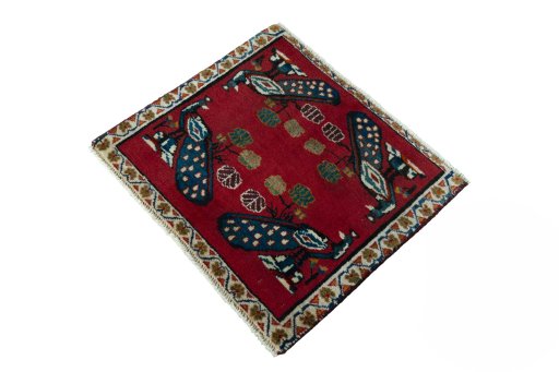 Corner detail of 2000s Shiraz rug showing border pattern and Wool pile