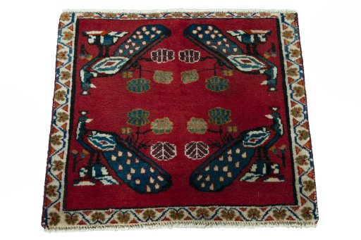 Surface texture of 2000s Shiraz rug with natural Wool and intricate pattern