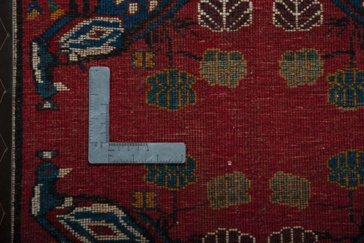 Backside of handmade 2000s Shiraz rug showing knot structure and weave density
