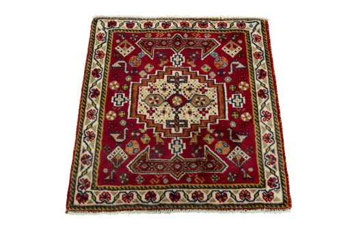 Surface texture of 2000s Shiraz rug with natural Wool and intricate pattern