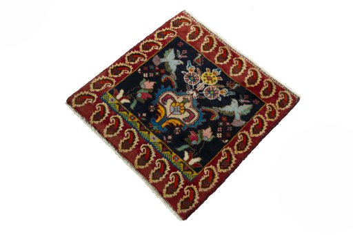 Corner detail of 2000s Shiraz rug showing border pattern and Wool pile