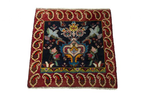 Surface texture of 2000s Shiraz rug with natural Wool and intricate pattern