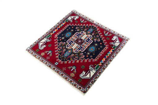 Corner detail of 2000s Shiraz rug showing border pattern and Wool pile