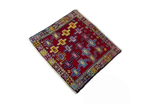 Corner detail of 2000s Shiraz rug showing border pattern and Wool pile