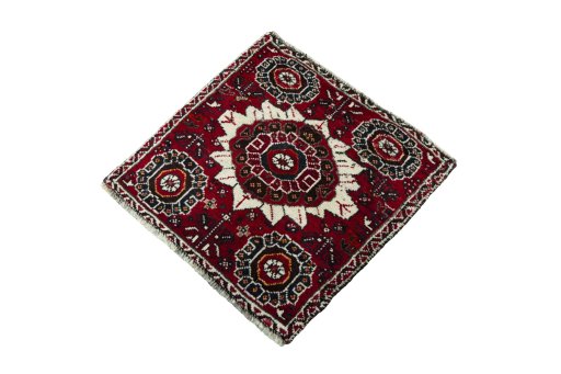 Corner detail of 2000s Shiraz rug showing border pattern and Wool pile