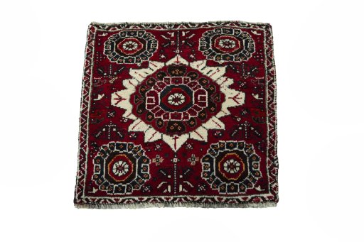 Surface texture of 2000s Shiraz rug with natural Wool and intricate pattern