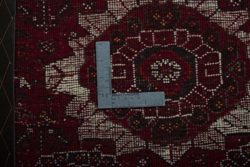 Backside of handmade 2000s Shiraz rug showing knot structure and weave density