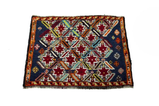 Surface texture of 2000s Shiraz rug with natural Wool and intricate pattern