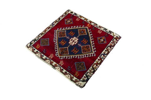 Corner detail of 2000s Shiraz rug showing border pattern and Wool pile
