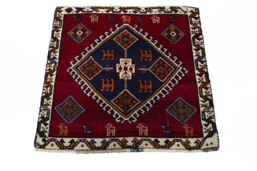 Surface texture of 2000s Shiraz rug with natural Wool and intricate pattern