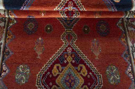Full view of 2000s Shiraz rug from Iran / Persia, 288 × 128 cm in Red tones