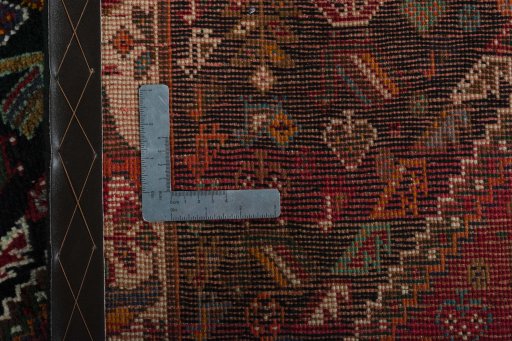 Surface texture of 2000s Shiraz rug with natural Wool and intricate pattern
