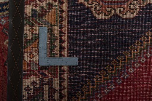 Surface texture of 2000s Shiraz rug with natural Wool and intricate pattern