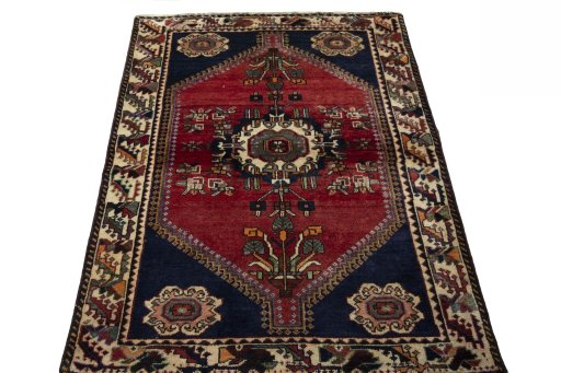 Surface texture of 2000s Shiraz rug with natural Wool and intricate pattern
