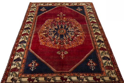 Surface texture of 2000s Shiraz rug with natural Wool and intricate pattern