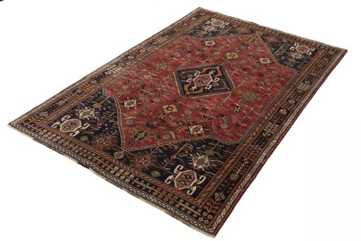 Corner detail of 2000s Shiraz rug showing border pattern and Wool pile