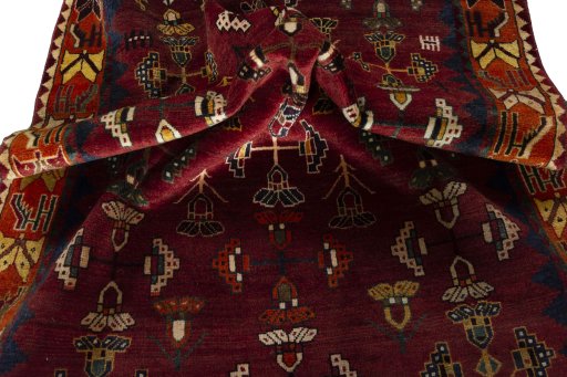 Corner detail of 2000s Shiraz rug showing border pattern and Wool pile