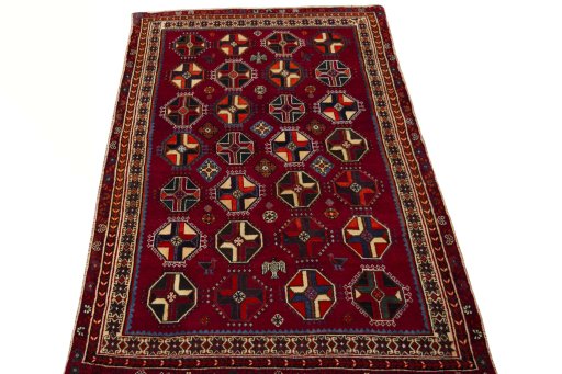 Surface texture of 2000s Shiraz rug with natural Wool and intricate pattern