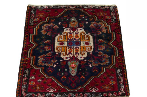 Surface texture of 2000s Shiraz rug with natural Wool and intricate pattern