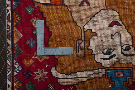 Backside of handmade 2000s Shiraz rug showing knot structure and weave density