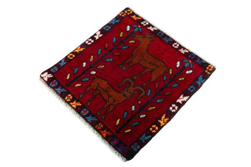 Corner detail of 2000s Shiraz rug showing border pattern and Wool pile