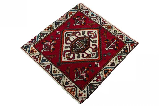 Corner detail of 2000s Shiraz rug showing border pattern and Wool pile
